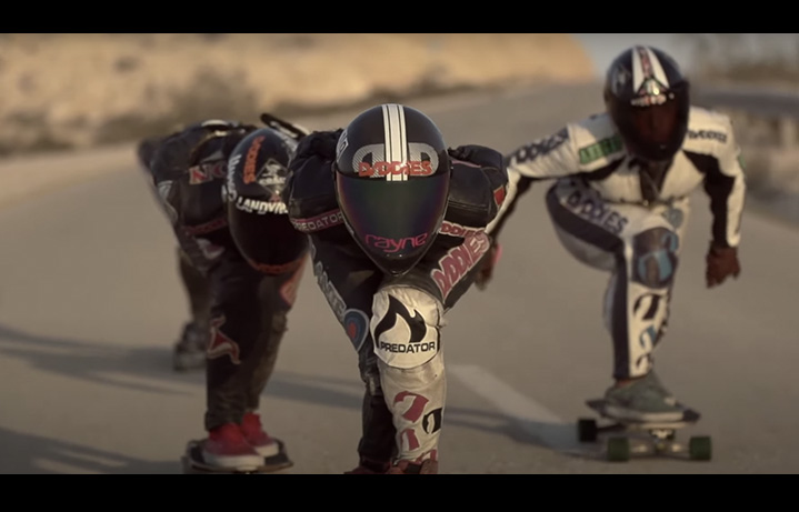 woman downhilling in a motbike suit